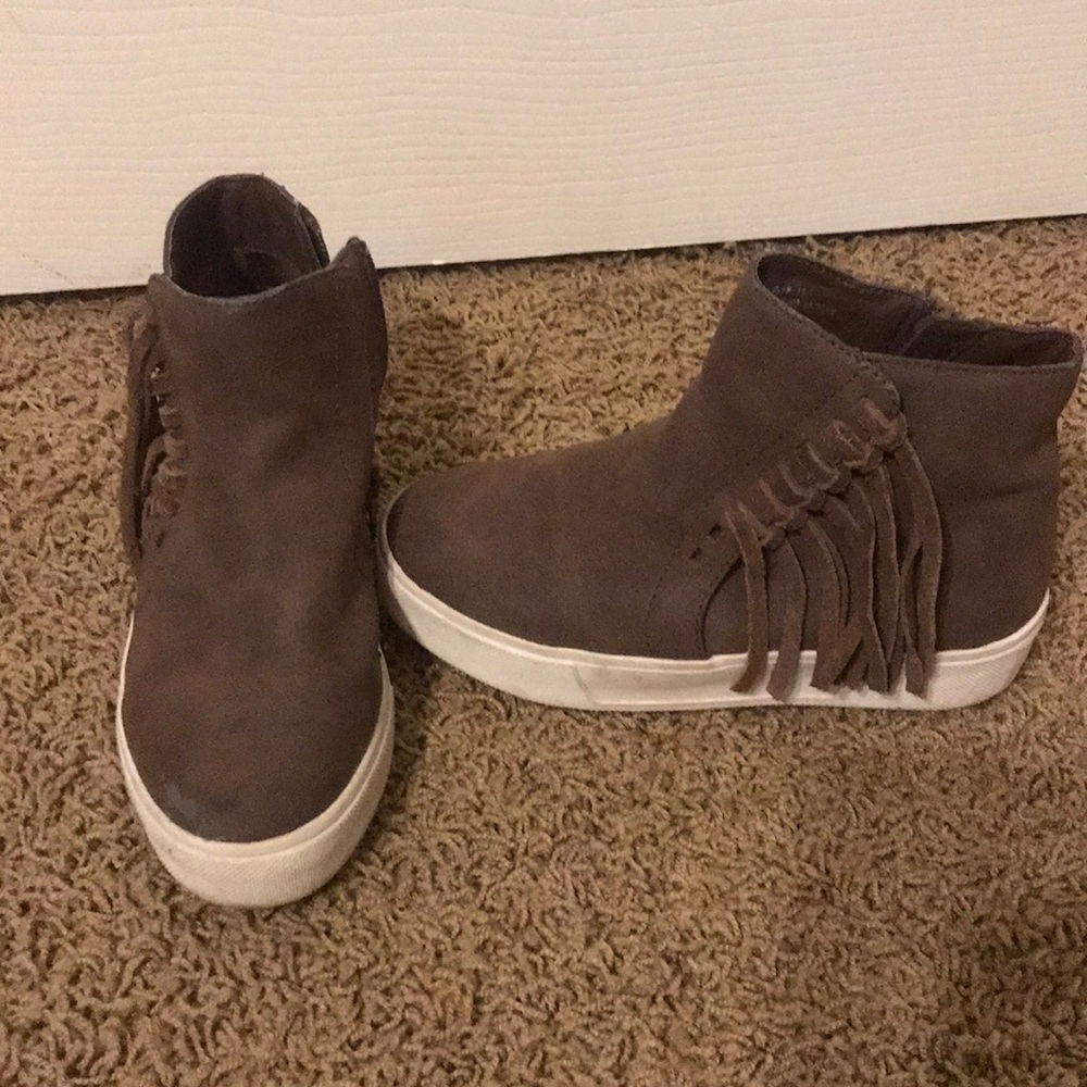 Volatile hidden wedge fringe bootie